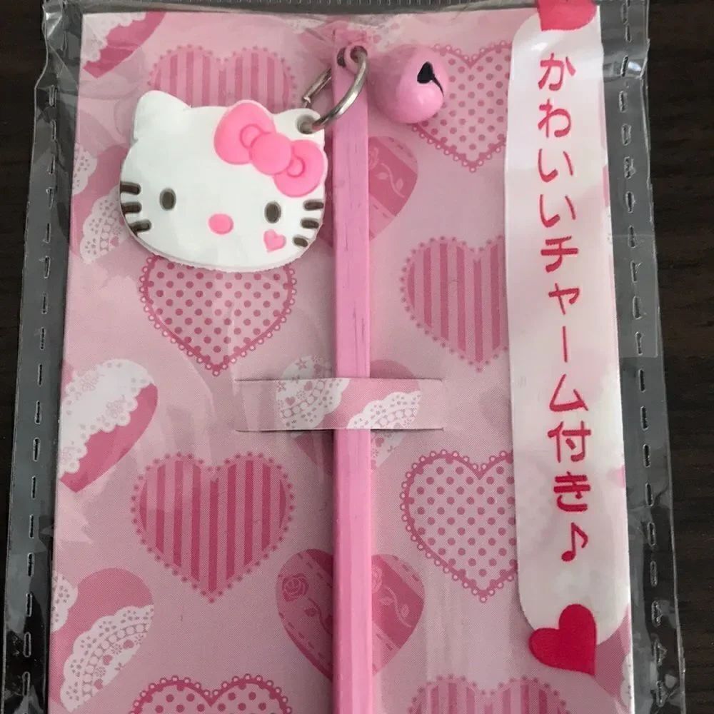NEW Hello kitty Ear pick